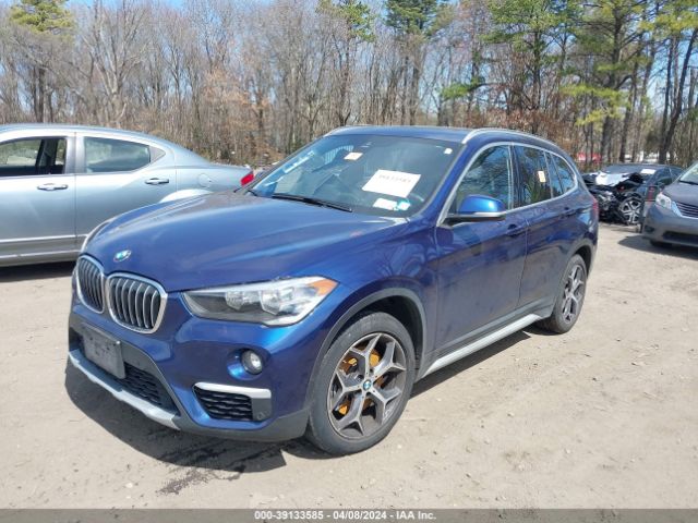 Photo 1 VIN: WBXHT3C58K5L91555 - BMW X1 