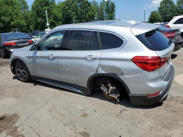 Photo 1 VIN: WBXHT3C59K3H36185 - BMW X1 