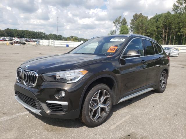 Photo 1 VIN: WBXHT3C59K5L37326 - BMW X1 XDRIVE2 