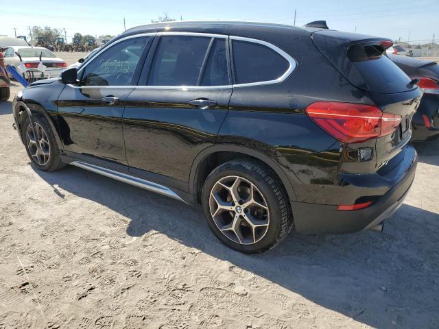 Photo 1 VIN: WBXHT3C5XK3H34607 - BMW X1 