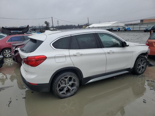 Photo 2 VIN: WBXHT3C5XK3H36681 - BMW X1 