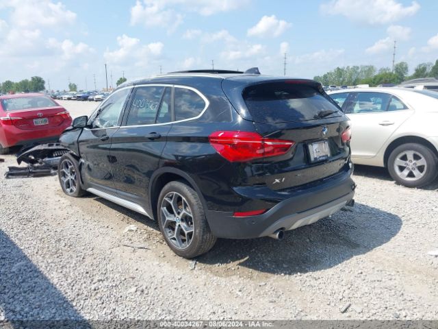 Photo 2 VIN: WBXHT3C5XK5L35729 - BMW X1 