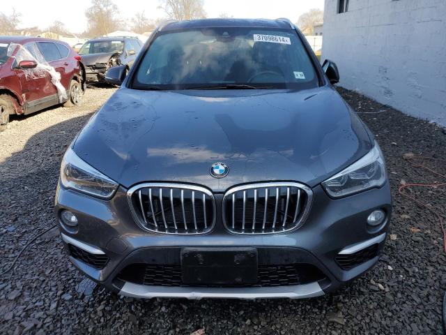 Photo 4 VIN: WBXHT3C5XK5L36122 - BMW X1 