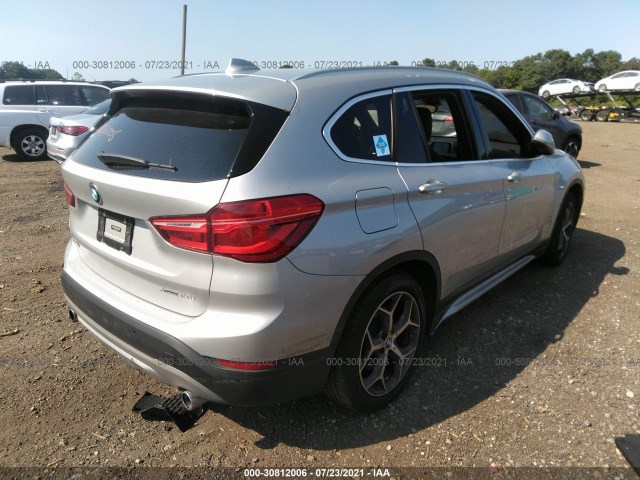 Photo 3 VIN: WBXHT3C5XK5L89306 - BMW X1 