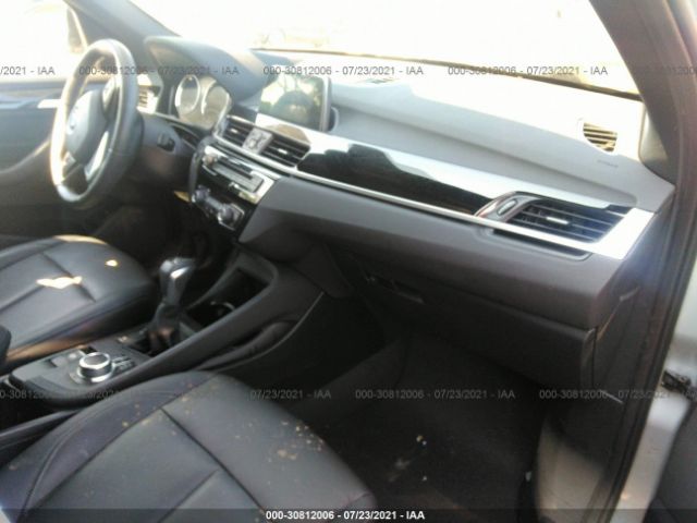 Photo 4 VIN: WBXHT3C5XK5L89306 - BMW X1 