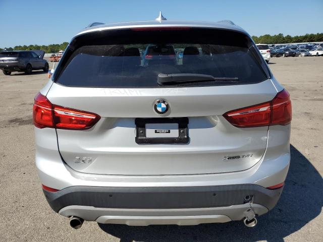 Photo 5 VIN: WBXHT3C5XK5L90942 - BMW X1 XDRIVE2 