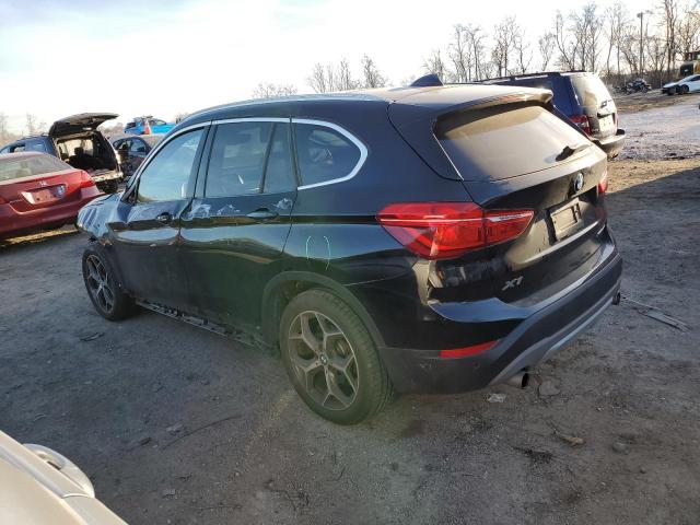 Photo 1 VIN: WBXHT3C5XK5N57297 - BMW X1 