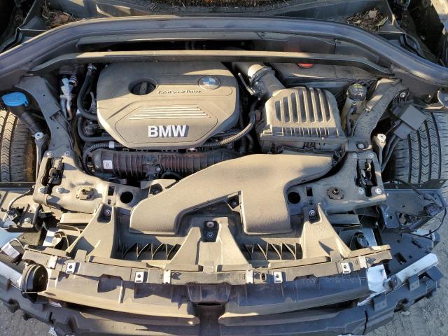 Photo 11 VIN: WBXHT3C5XK5N57297 - BMW X1 