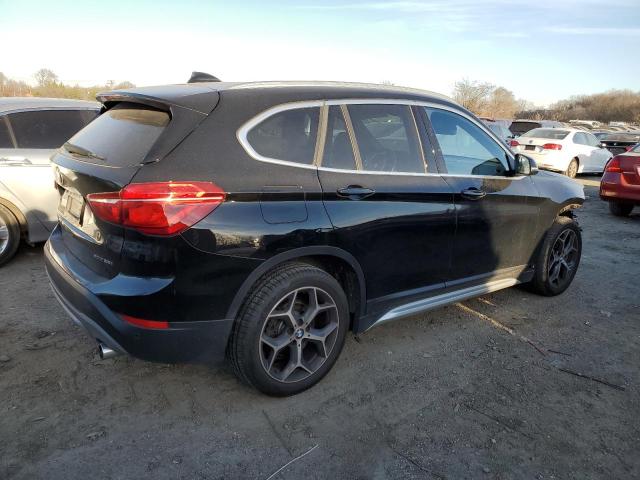 Photo 2 VIN: WBXHT3C5XK5N57297 - BMW X1 