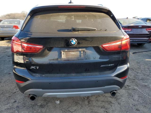 Photo 5 VIN: WBXHT3C5XK5N57297 - BMW X1 