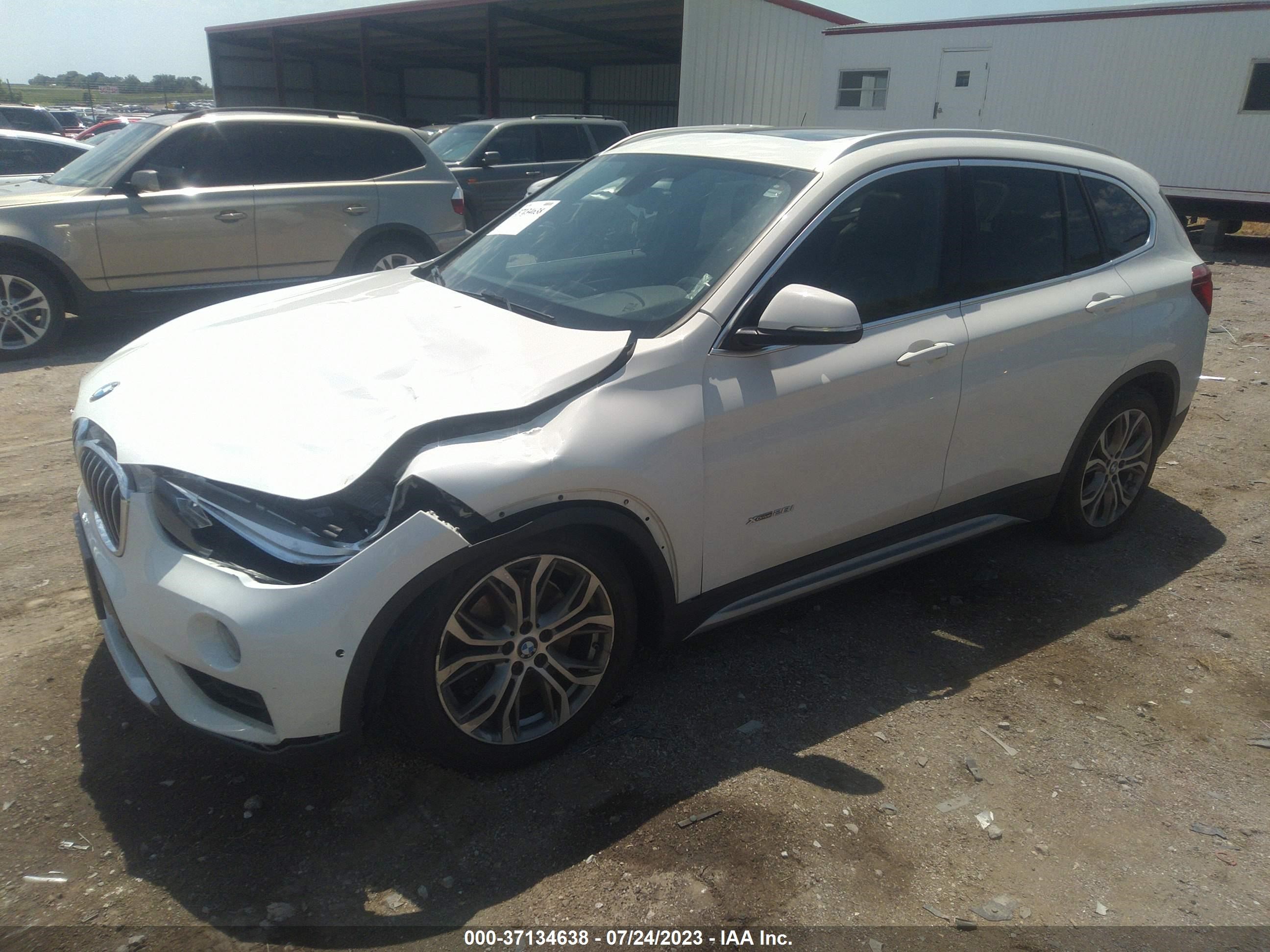 Photo 1 VIN: WBXHT3Z30G4A47904 - BMW X1 