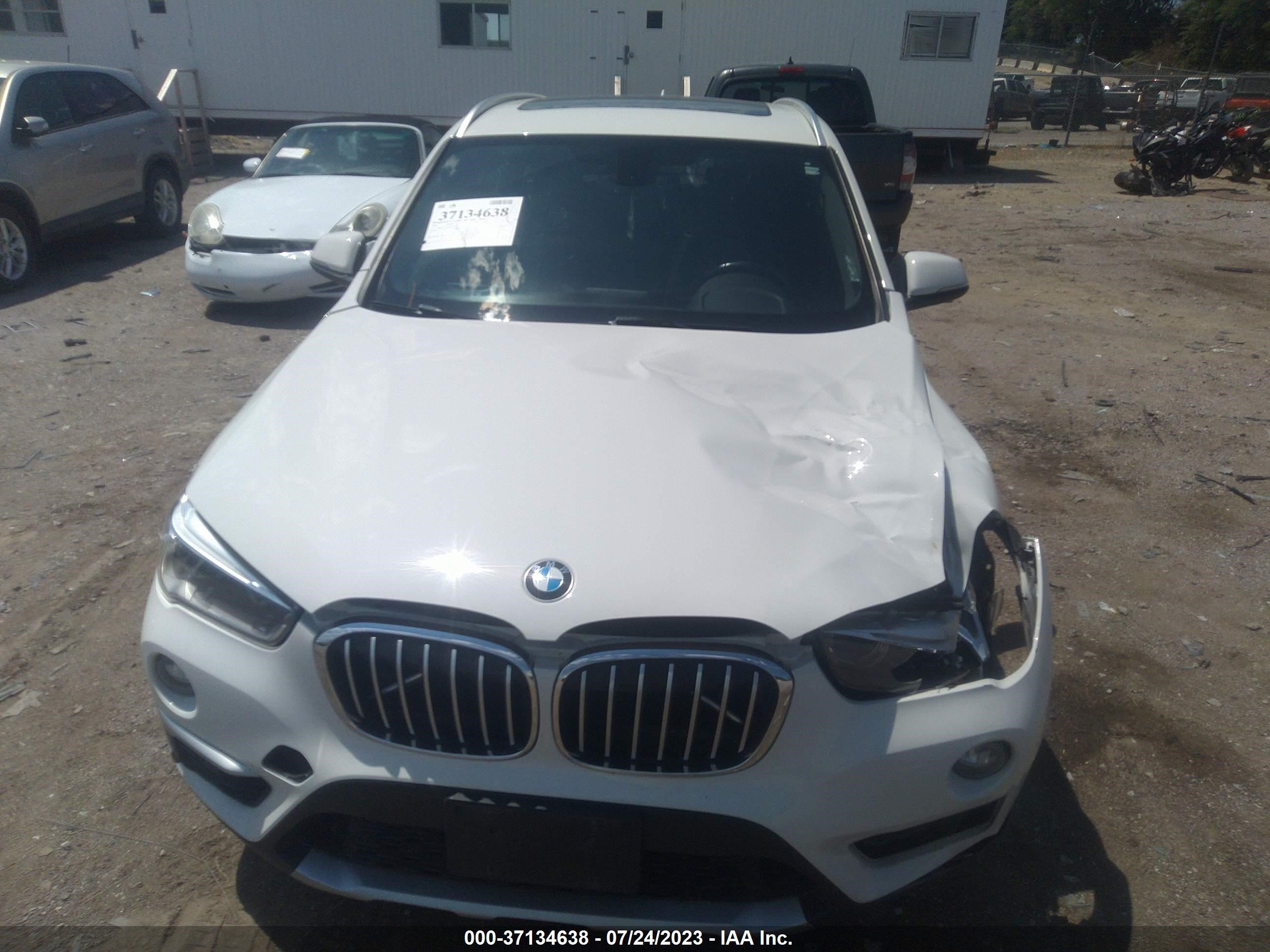 Photo 11 VIN: WBXHT3Z30G4A47904 - BMW X1 