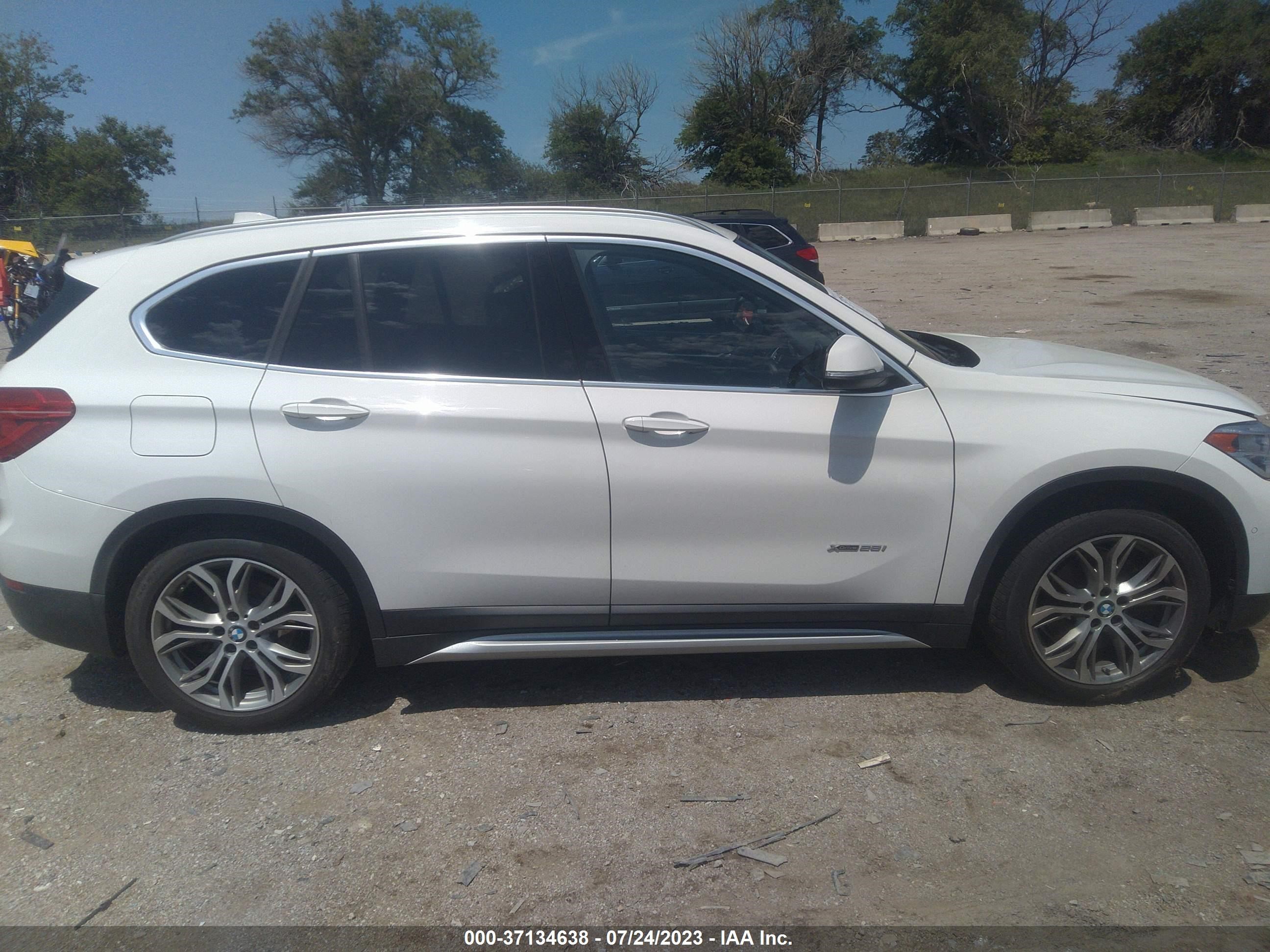 Photo 12 VIN: WBXHT3Z30G4A47904 - BMW X1 