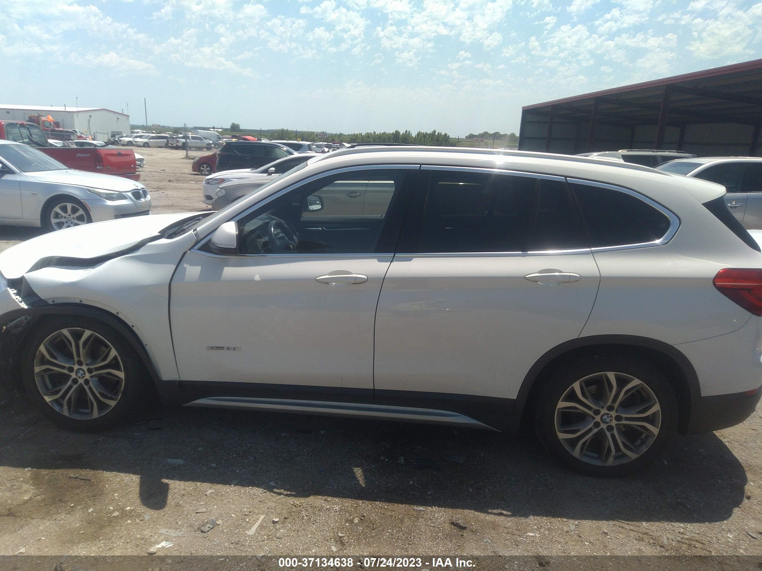 Photo 13 VIN: WBXHT3Z30G4A47904 - BMW X1 