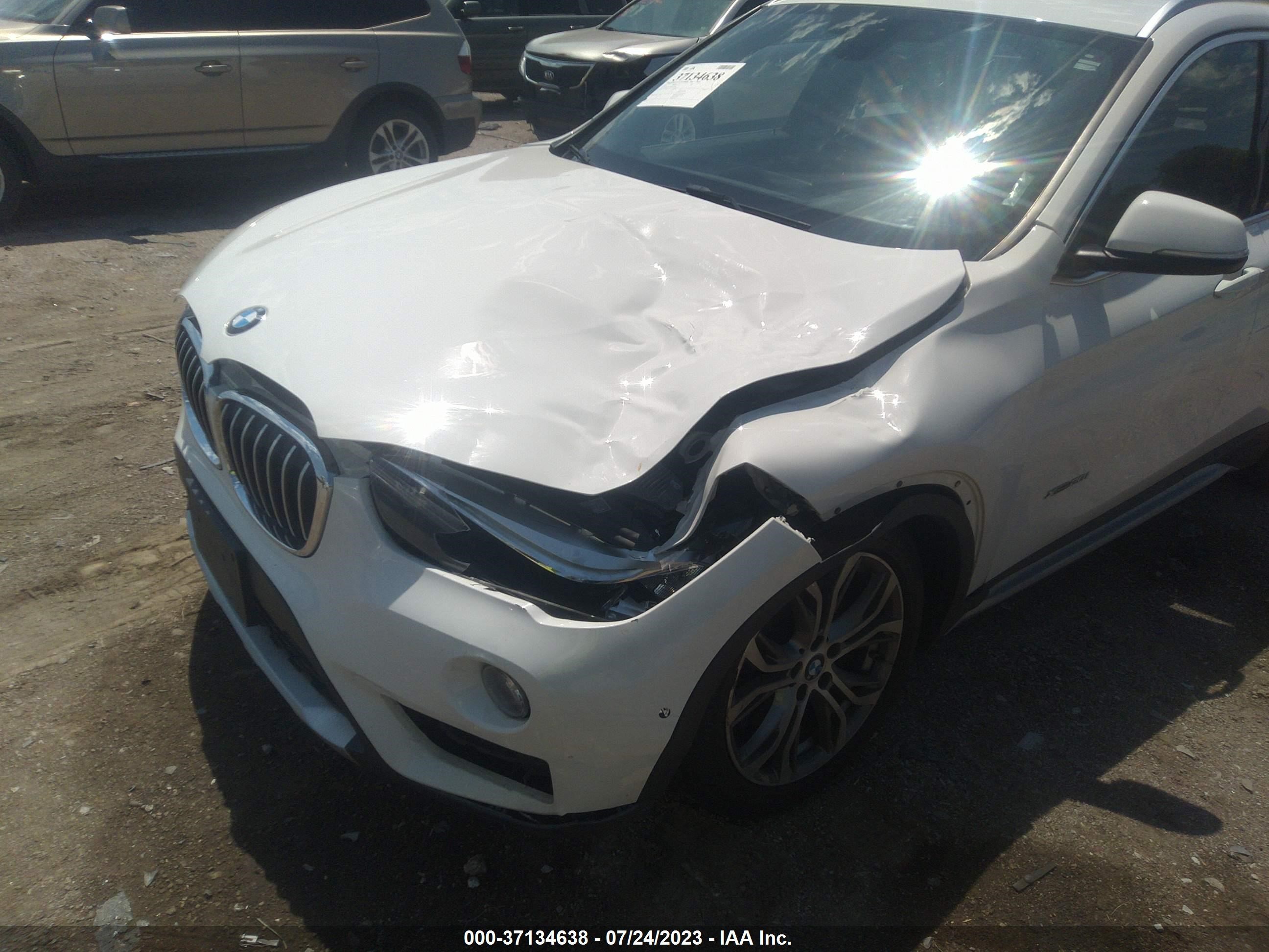 Photo 5 VIN: WBXHT3Z30G4A47904 - BMW X1 