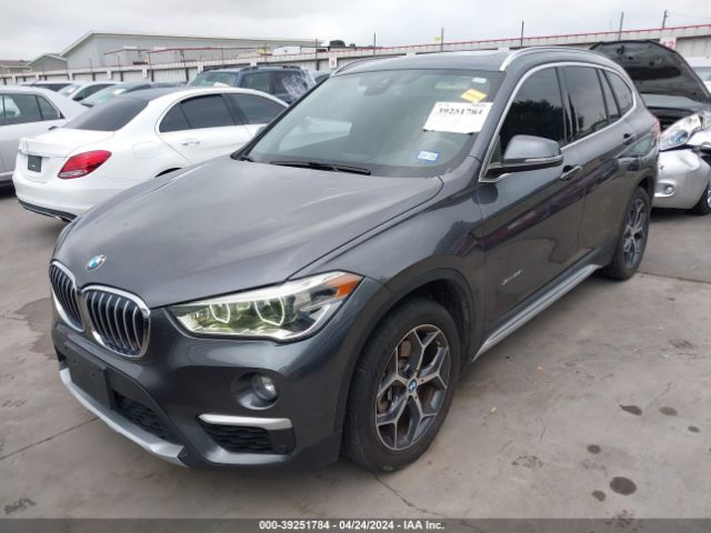 Photo 1 VIN: WBXHT3Z30G4A47966 - BMW X1 