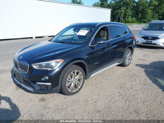 Photo 1 VIN: WBXHT3Z30G4A48910 - BMW X1 