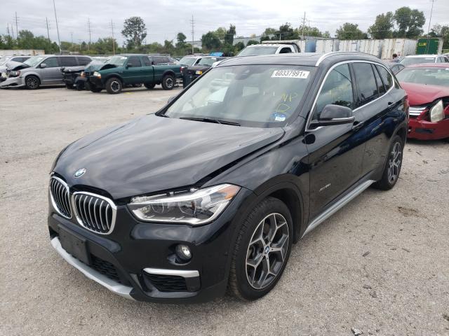 Photo 1 VIN: WBXHT3Z30G4A51855 - BMW X1 