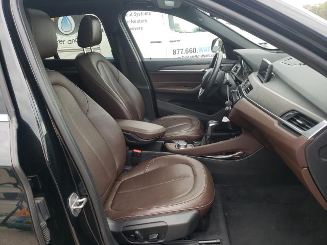 Photo 4 VIN: WBXHT3Z30G4A51855 - BMW X1 