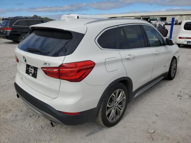 Photo 3 VIN: WBXHT3Z30H4A55566 - BMW X1 XDRIVE2 