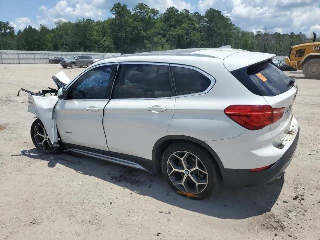 Photo 1 VIN: WBXHT3Z30H4A65689 - BMW X1 XDRIVE2 