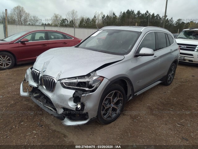 Photo 1 VIN: WBXHT3Z31G4A49855 - BMW X1 