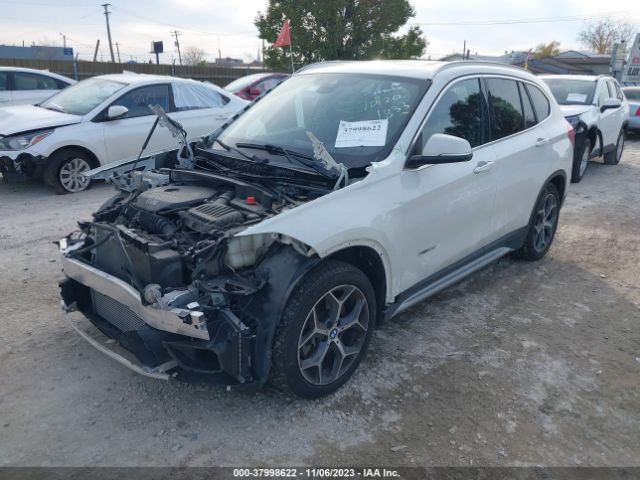 Photo 1 VIN: WBXHT3Z31G4A51833 - BMW X1 