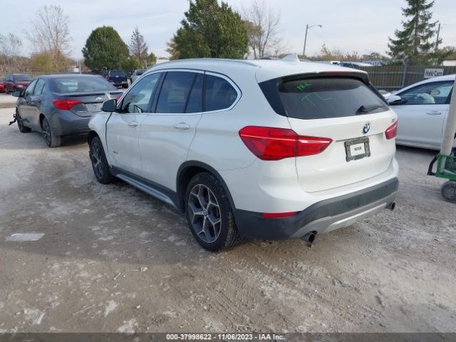 Photo 2 VIN: WBXHT3Z31G4A51833 - BMW X1 