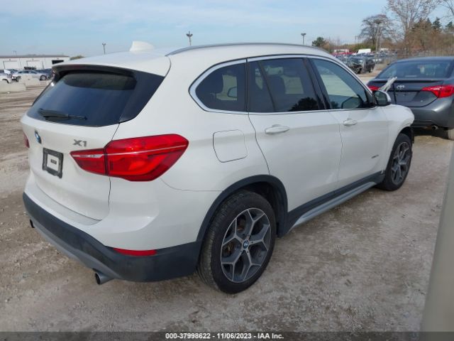 Photo 3 VIN: WBXHT3Z31G4A51833 - BMW X1 