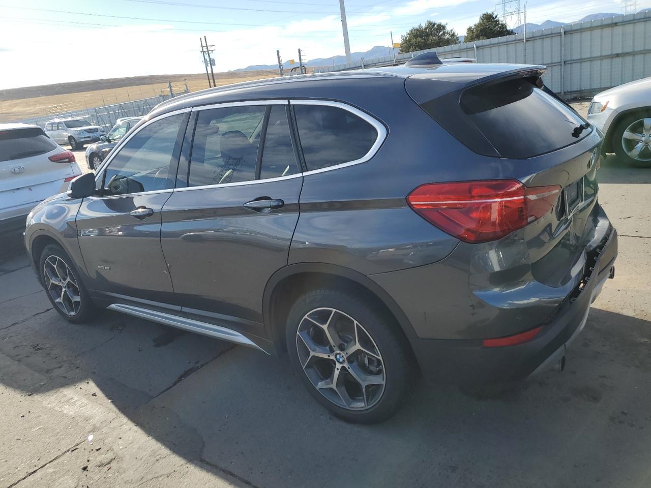 Photo 1 VIN: WBXHT3Z31H4A54040 - BMW X1 