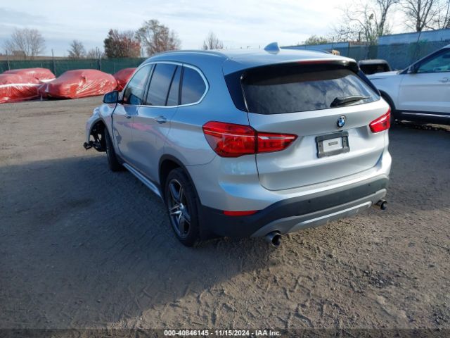 Photo 2 VIN: WBXHT3Z31H4A57696 - BMW X1 