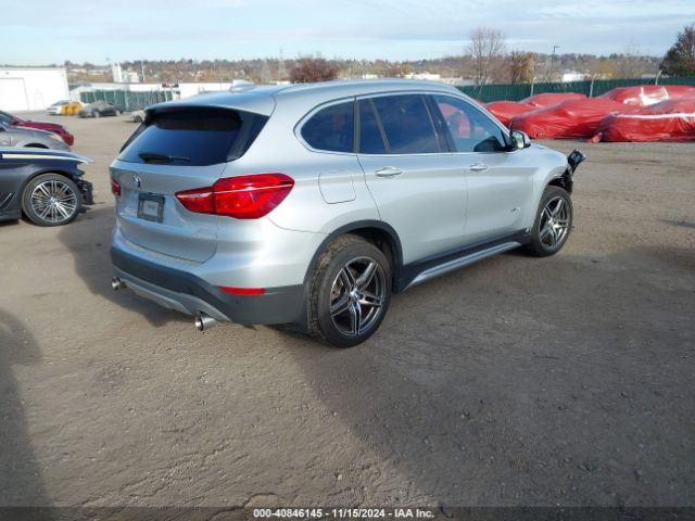 Photo 3 VIN: WBXHT3Z31H4A57696 - BMW X1 