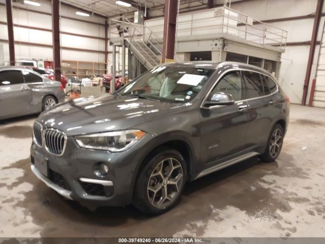 Photo 1 VIN: WBXHT3Z31H4A64972 - BMW X1 