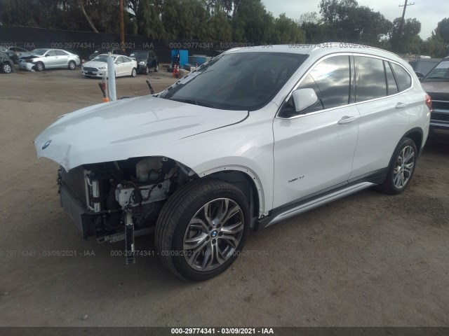 Photo 1 VIN: WBXHT3Z32G4A47872 - BMW X1 