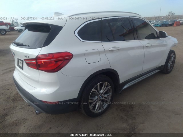 Photo 3 VIN: WBXHT3Z32G4A47872 - BMW X1 