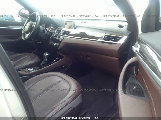 Photo 4 VIN: WBXHT3Z32G4A47872 - BMW X1 