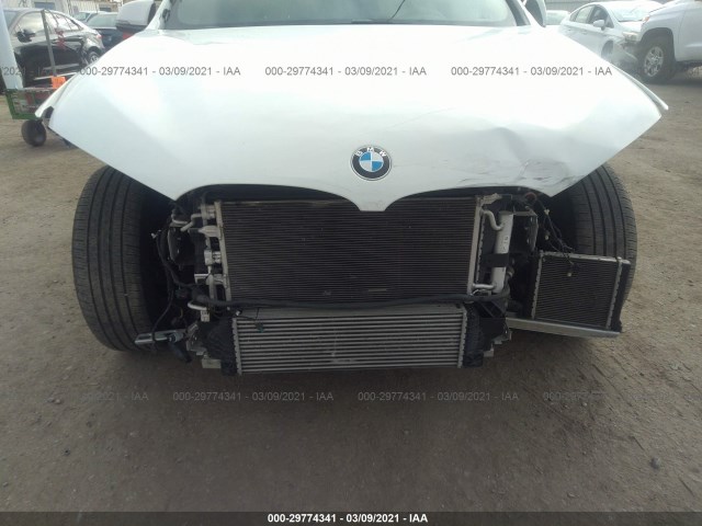 Photo 5 VIN: WBXHT3Z32G4A47872 - BMW X1 