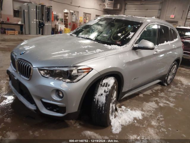 Photo 1 VIN: WBXHT3Z32G4A49332 - BMW X1 