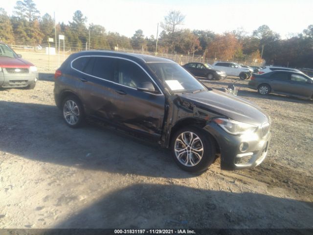 Photo 0 VIN: WBXHT3Z32G4A49492 - BMW X1 