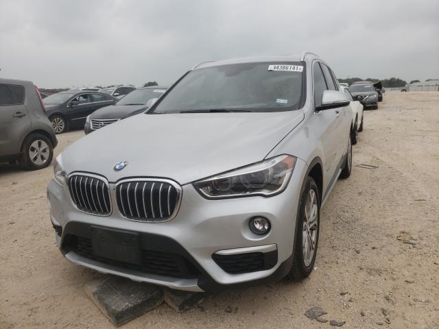 Photo 1 VIN: WBXHT3Z32G4A50786 - BMW X1 XDRIVE2 