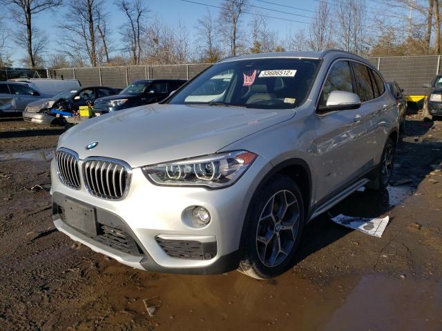 Photo 1 VIN: WBXHT3Z32G4A51789 - BMW X1 