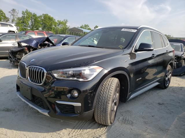 Photo 1 VIN: WBXHT3Z32H4A54855 - BMW X1 XDRIVE2 