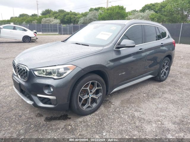 Photo 1 VIN: WBXHT3Z32H4A54919 - BMW X1 