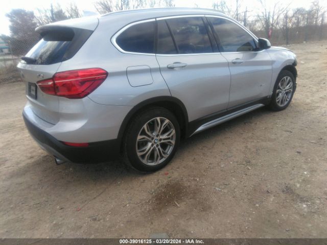 Photo 3 VIN: WBXHT3Z32H4A56170 - BMW X1 