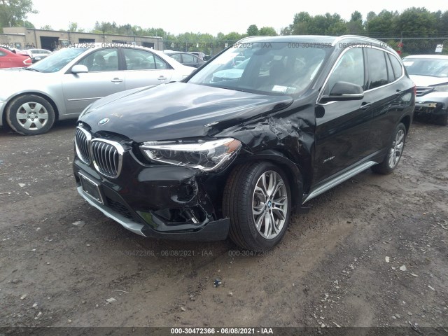 Photo 1 VIN: WBXHT3Z32H4A65340 - BMW X1 