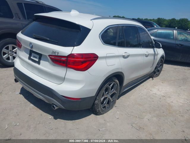 Photo 3 VIN: WBXHT3Z33G4A47590 - BMW X1 