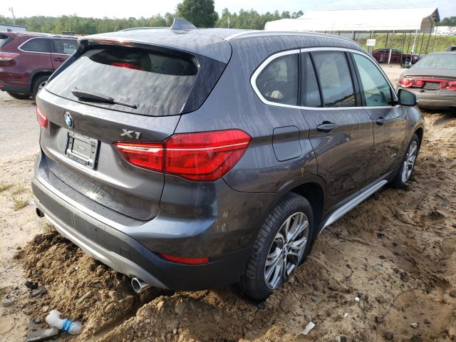 Photo 3 VIN: WBXHT3Z33G4A49484 - BMW X1 