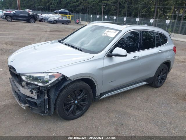 Photo 1 VIN: WBXHT3Z33G4A50375 - BMW X1 