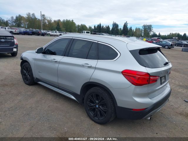 Photo 2 VIN: WBXHT3Z33G4A50375 - BMW X1 