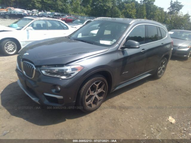 Photo 1 VIN: WBXHT3Z33G4A51154 - BMW X1 